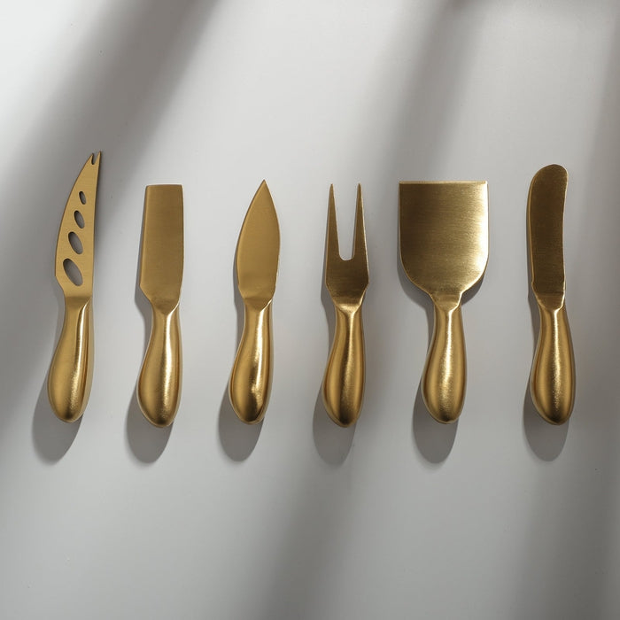 https://jazzupco.com/cdn/shop/products/Gilded-Cheese-Knife-Collection-JAZZUPCO-Matte-Gold-3.jpg?v=1646781812&width=700